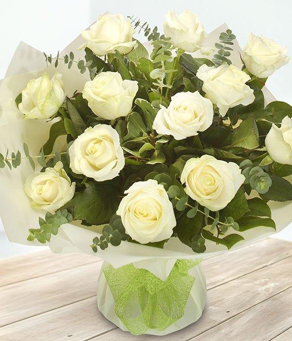 A Dozen White Roses in a vase